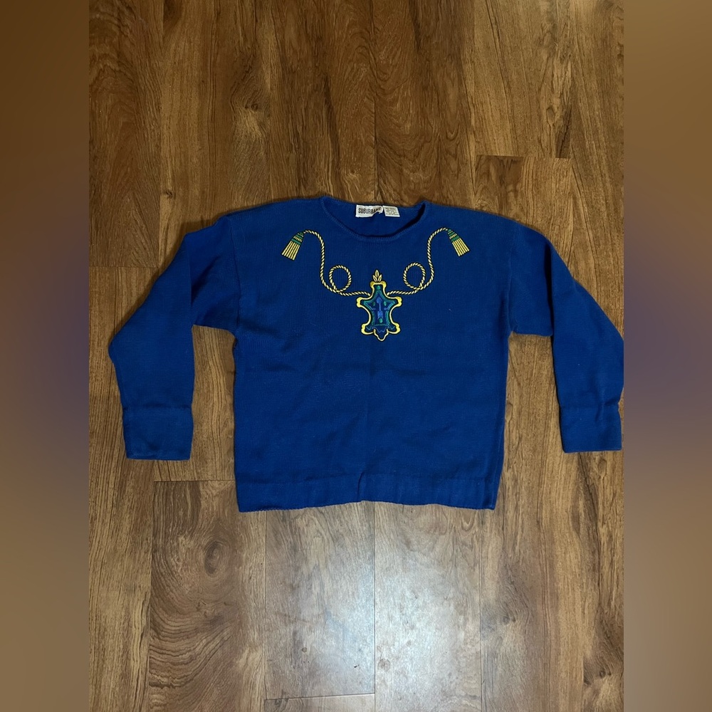 Royal Blue vintage crewneck sweater by Suburban with embroidered design.Size M